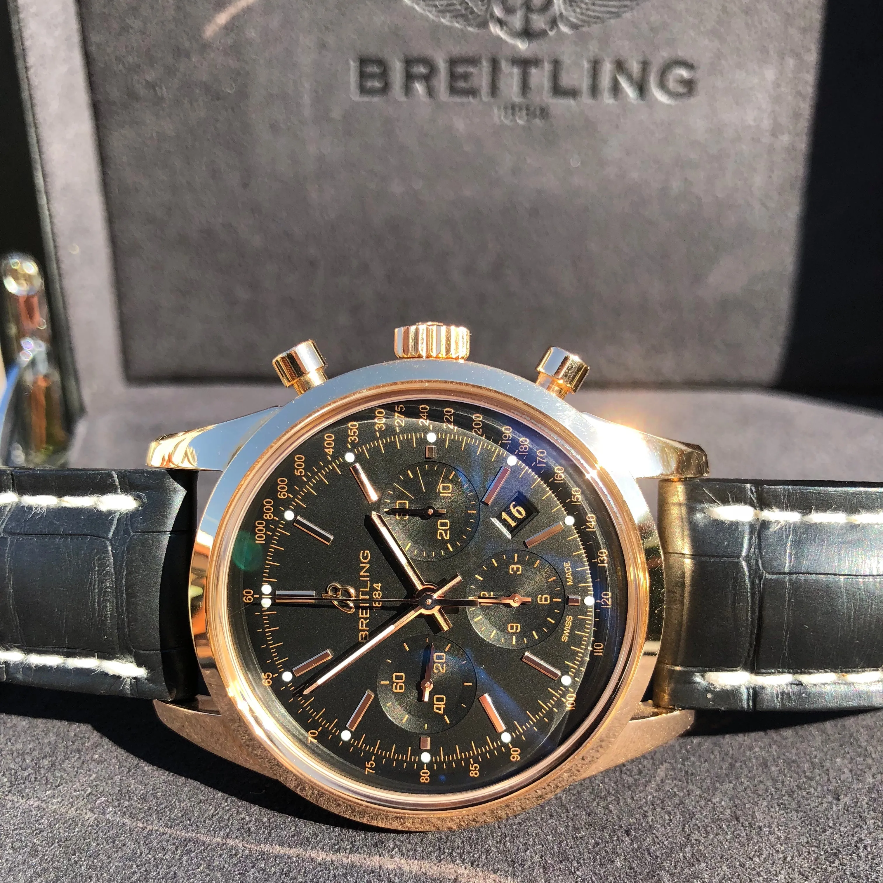 Breitling Transocean RB015212 18K Rose Gold Chronograph Black Dial Wristwatch Box Papers
