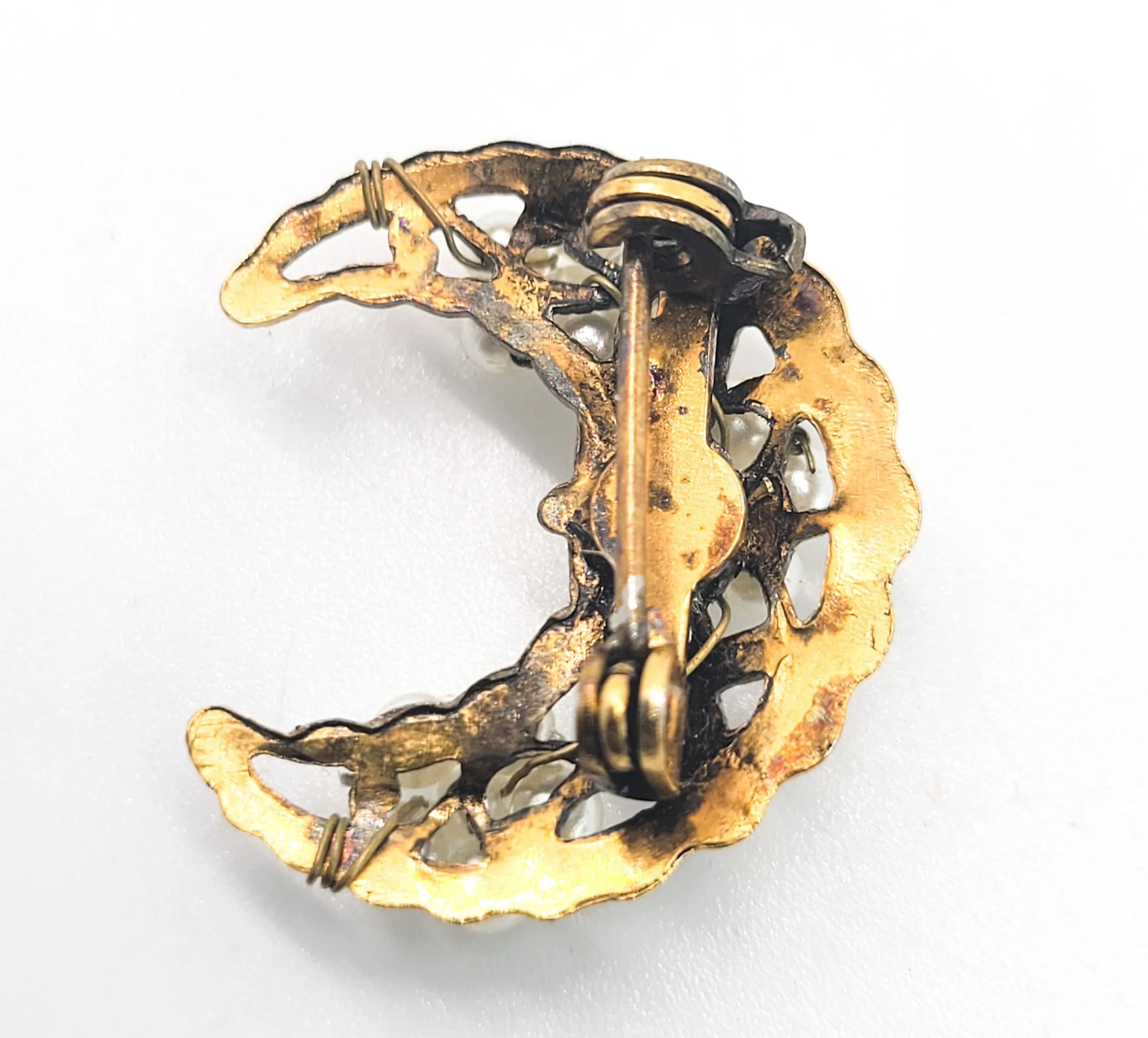 Crescent moon gold toned vintage brooch with beaded white flower accents