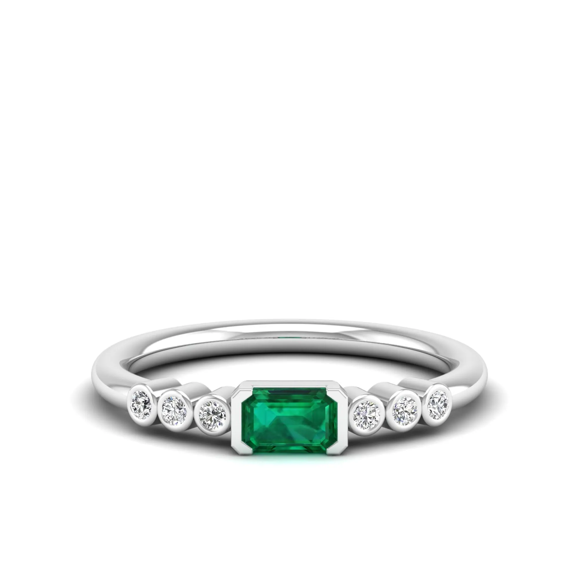 East-West Emerald and Bezel Diamond Ring
