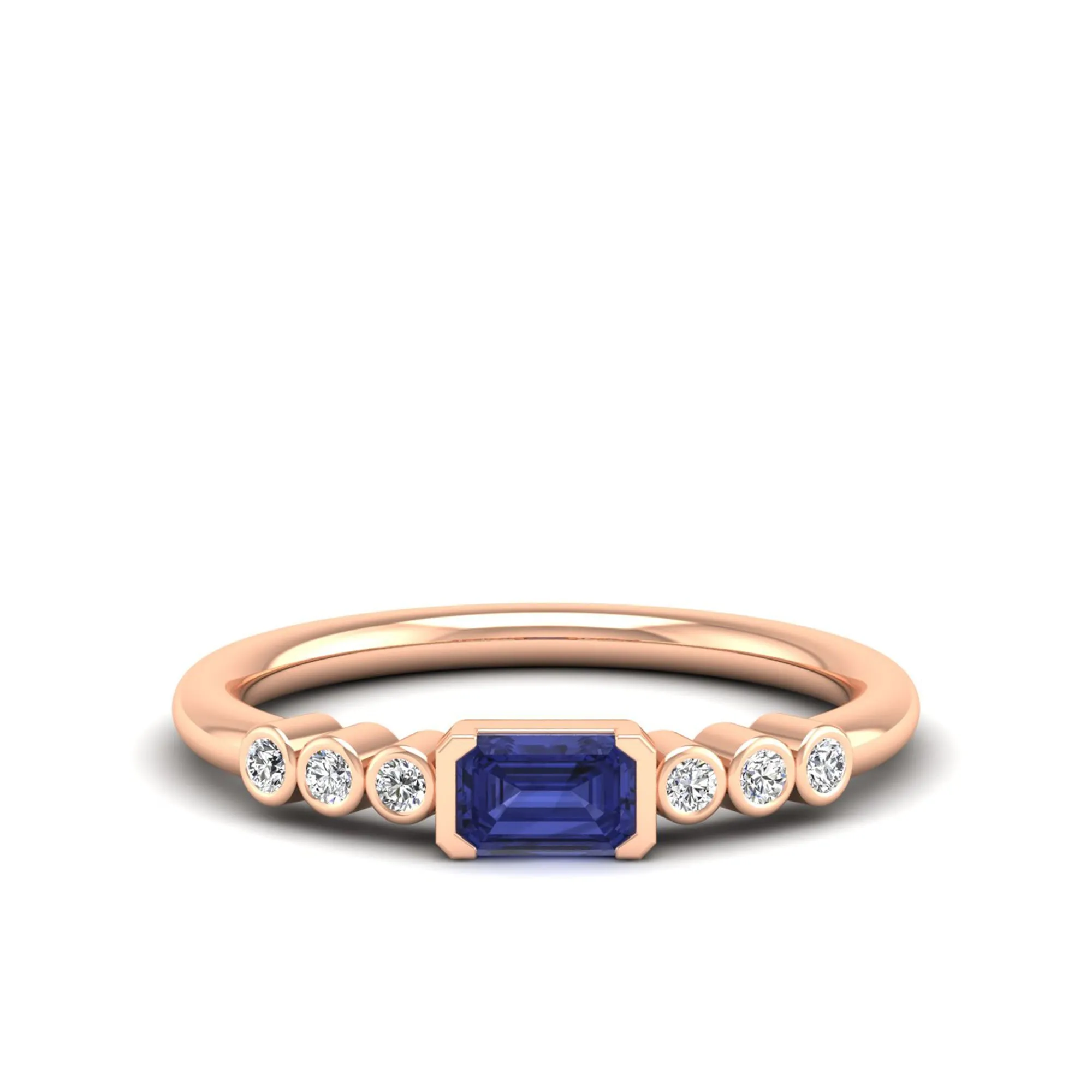 East-West Tanzanite and Bezel Diamond Ring