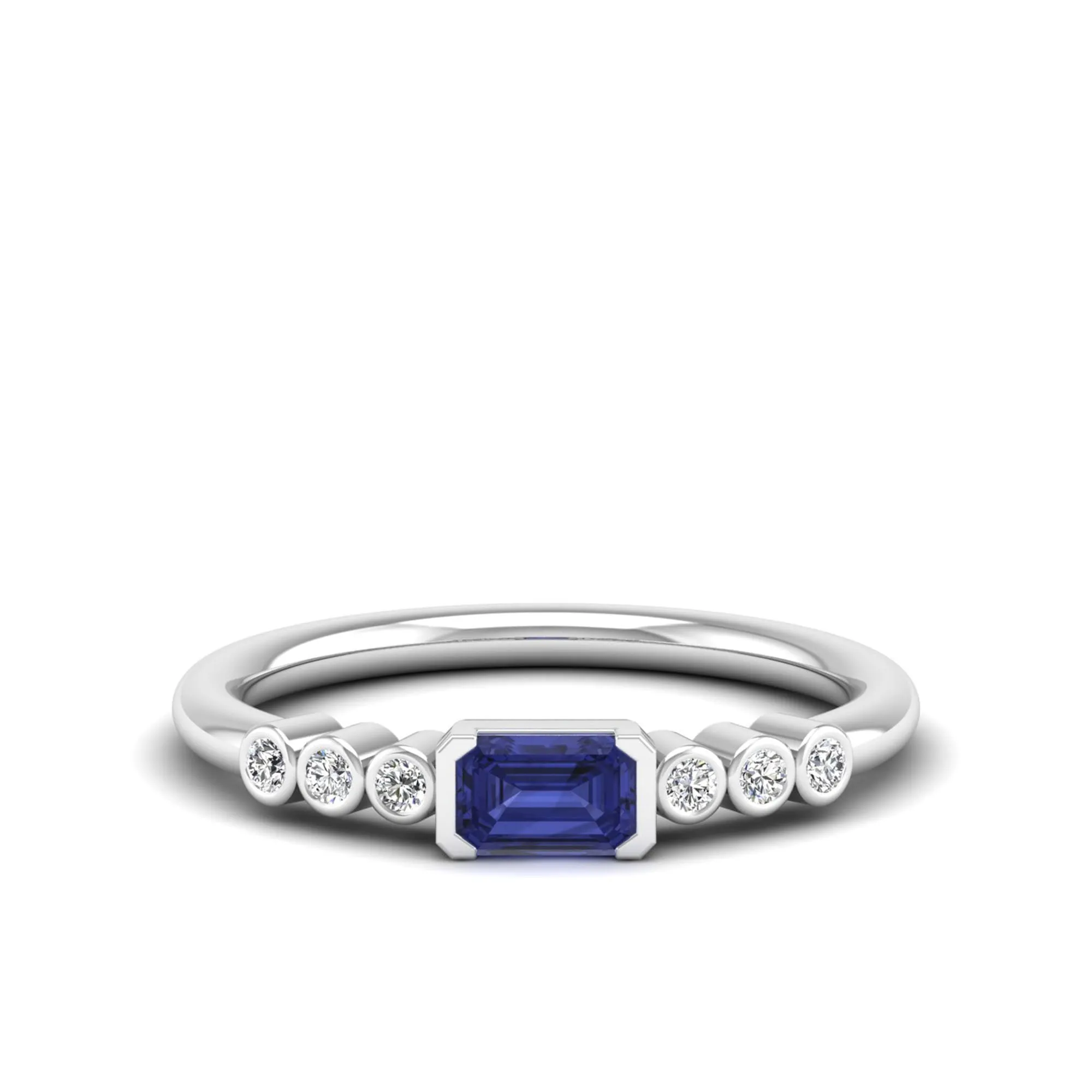 East-West Tanzanite and Bezel Diamond Ring