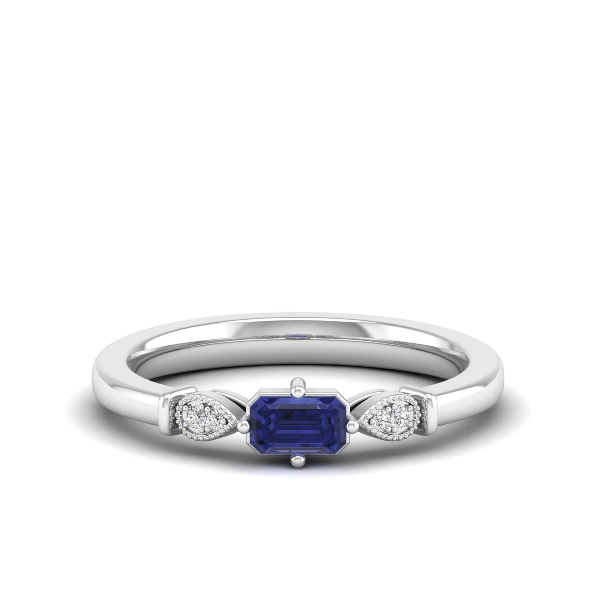 East-West Tanzanite and Filligree Diamond Ring