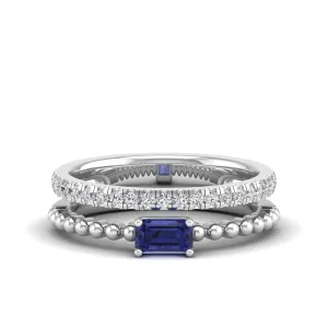 Emerald Cut East-West Tanzanite and Diamond Ring