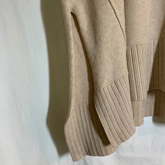 Free People 'Orion' beige V neck boxy fit tunic sweater