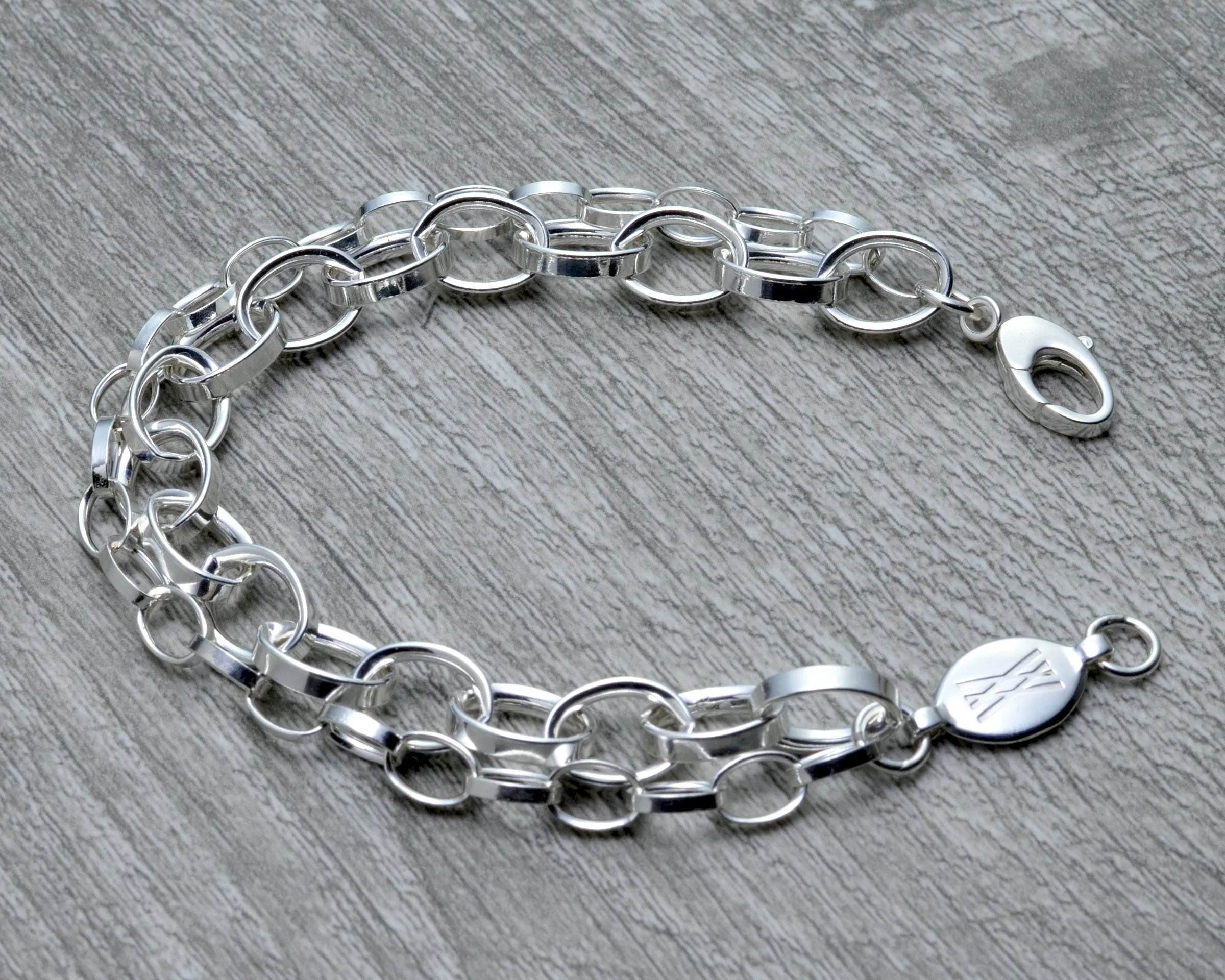 LAYERED CHUNKY SILVER CHARM BRACELET