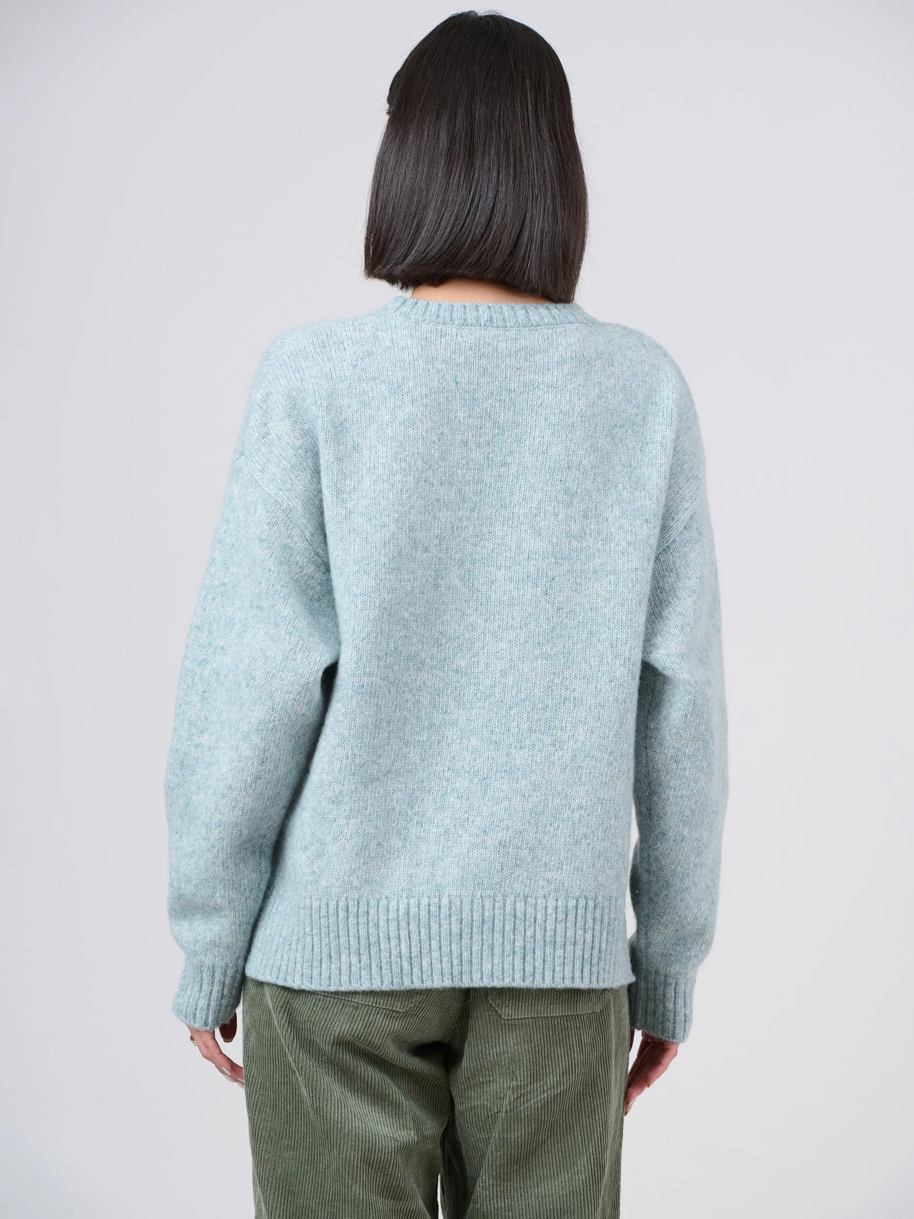 Pull boxy en laine et coton avec échancrures latérales