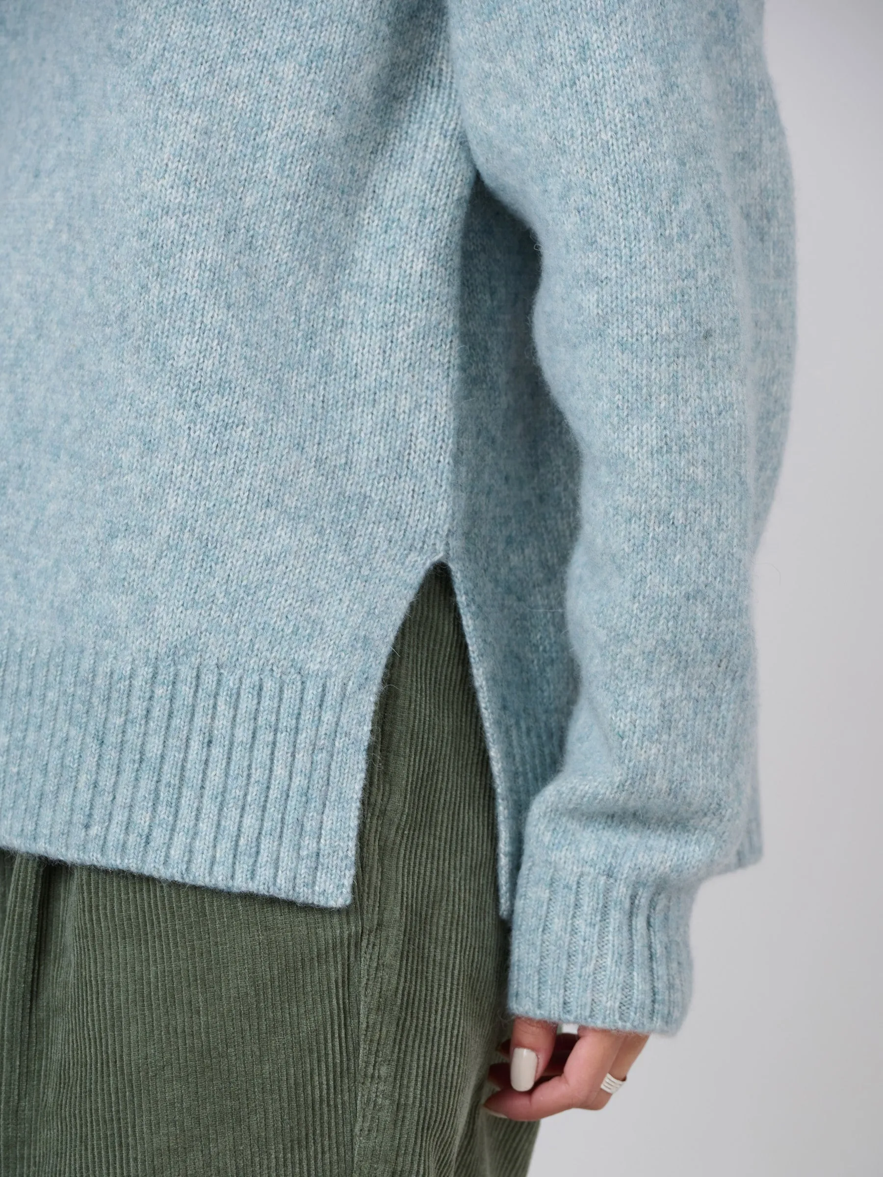 Pull boxy en laine et coton avec échancrures latérales