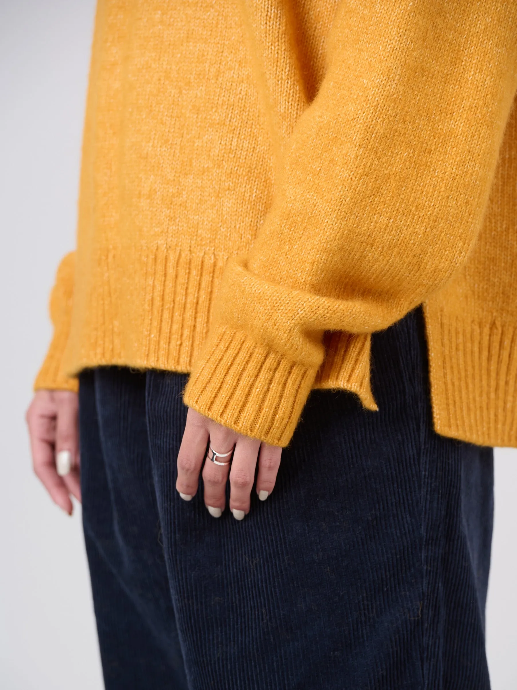 Pull boxy en laine et coton avec échancrures latérales