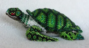 Sea Turtle: medium; black, green, and bright blue
