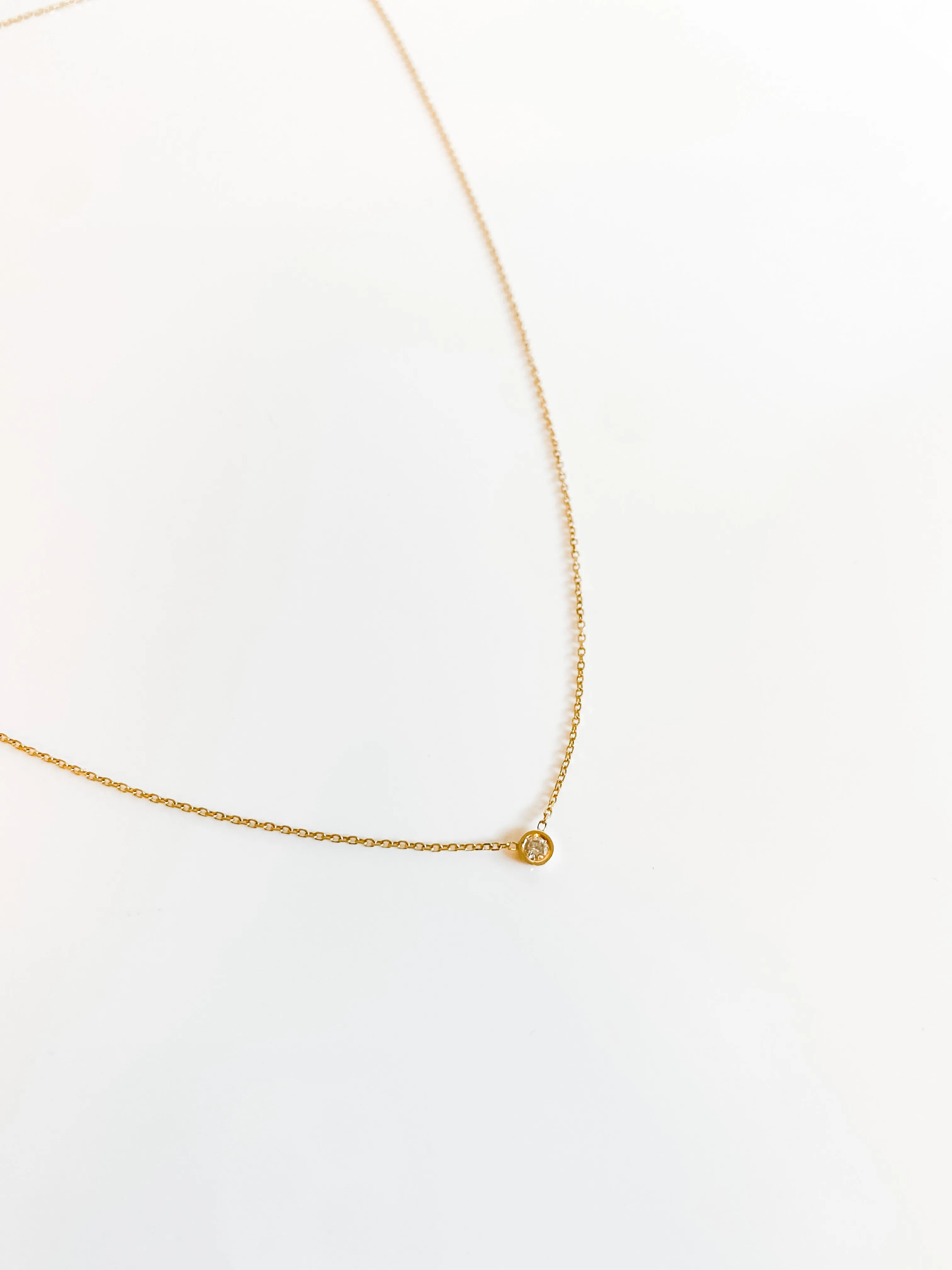 SOLID GOLD PETITE FLOATING DIAMOND