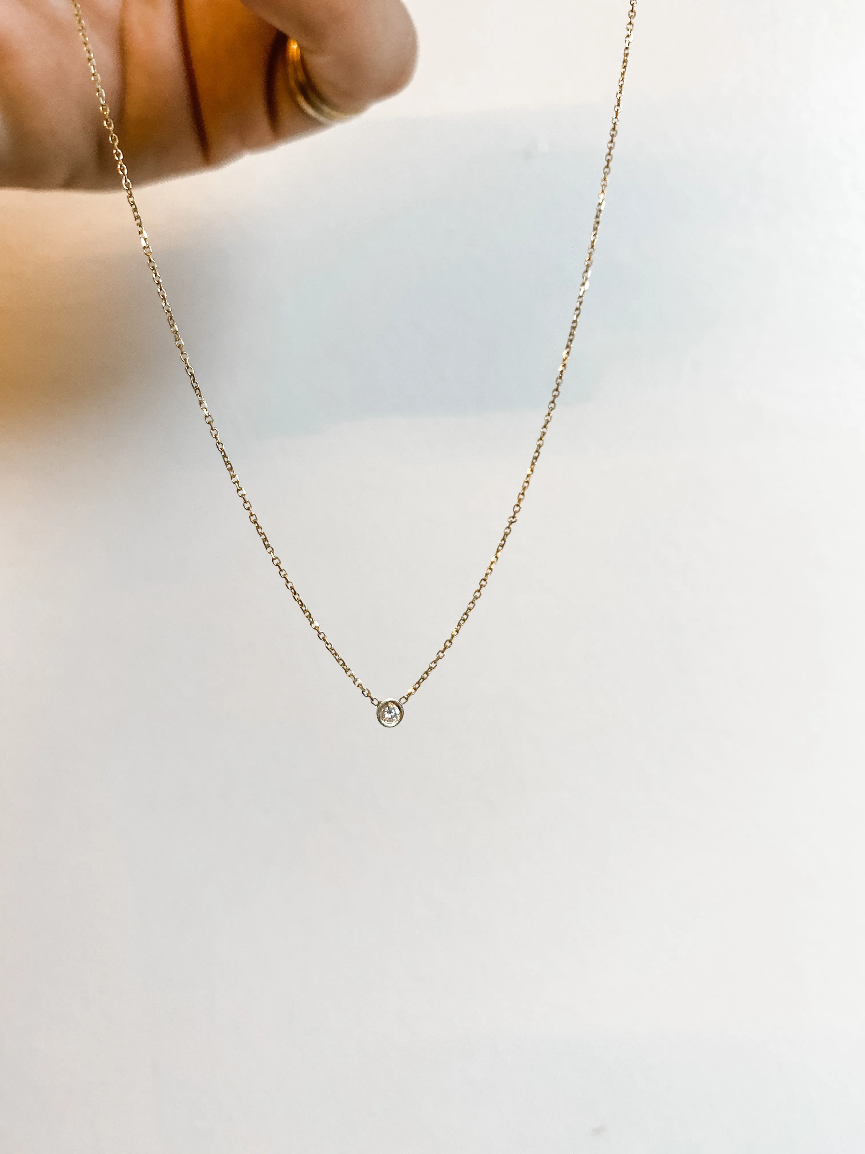 SOLID GOLD PETITE FLOATING DIAMOND