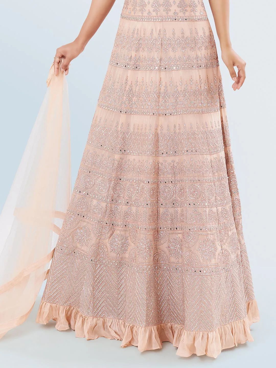 Splendid Mirror Work and Embroidered Peach Gown Paired with Net Dupatta