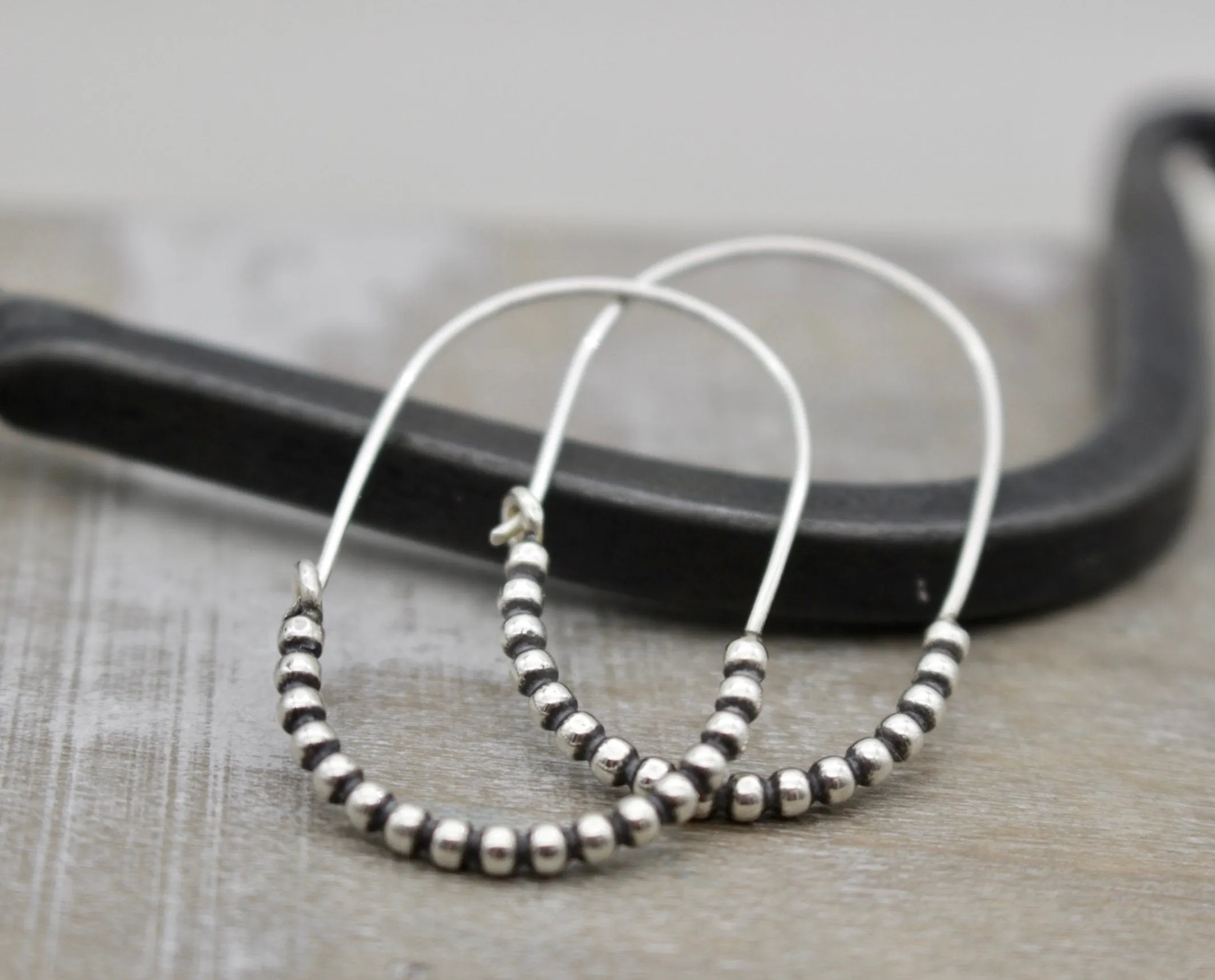 Sterling silver beaded hoop earring