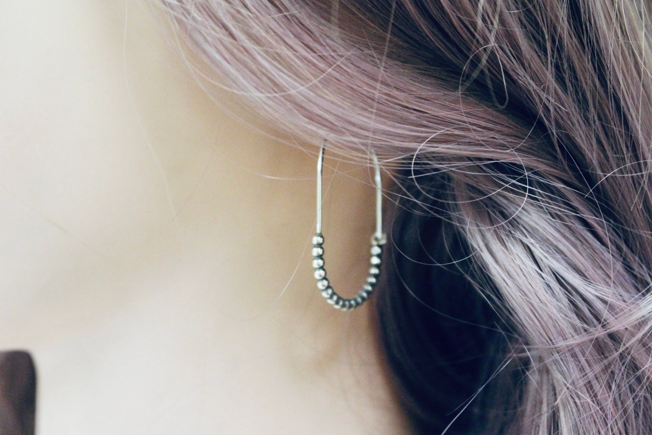 Sterling silver beaded hoop earring