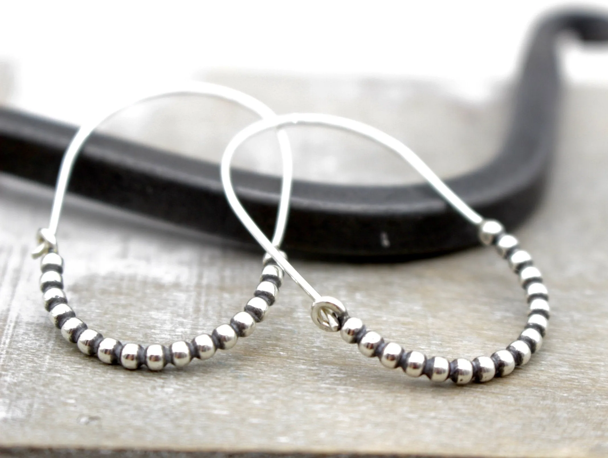 Sterling silver beaded hoop earring