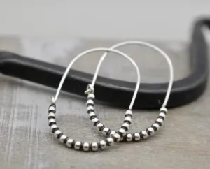 Sterling silver beaded hoop earring
