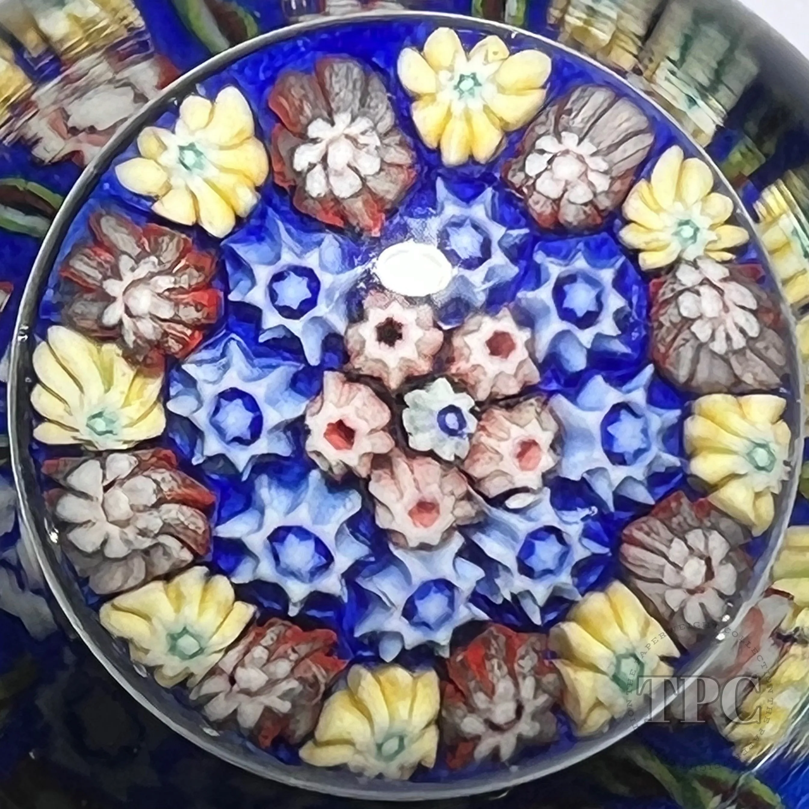 Vintage Vasart Glass Art Paperweight Style Bottle with Radial Ribbon Twists and Millefiori on Opaque Blue Ground